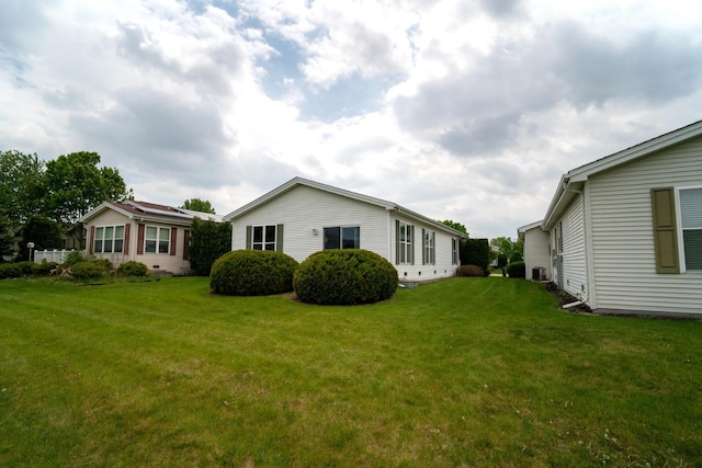 3404 Steeplechase Way, Grayslake, IL 60030 - back of property with a lawn and central AC unit