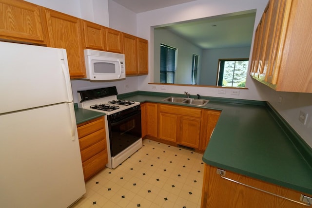 3404 Steeplechase Way, Grayslake, IL 60030 - kitchen featuring white appliances, a sink, dark countertops, and brown cabinetry