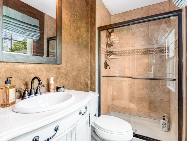 302 Delaware Dr, Bolingbrook, IL 60440 - bathroom featuring vanity, toilet, and a shower stall