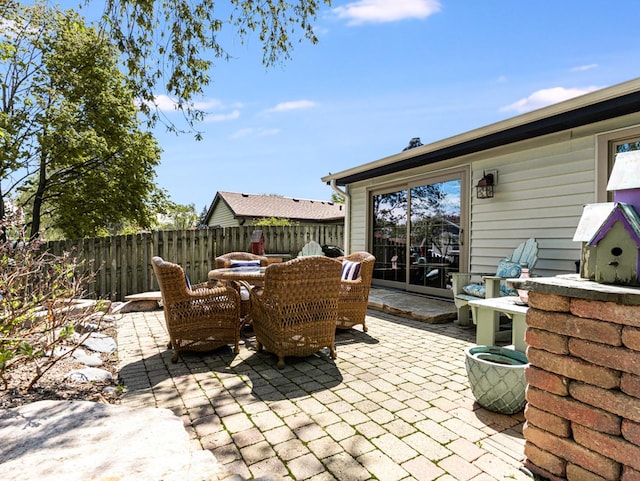 302 Delaware Dr, Bolingbrook, IL 60440 - view of patio featuring fence and outdoor dining space