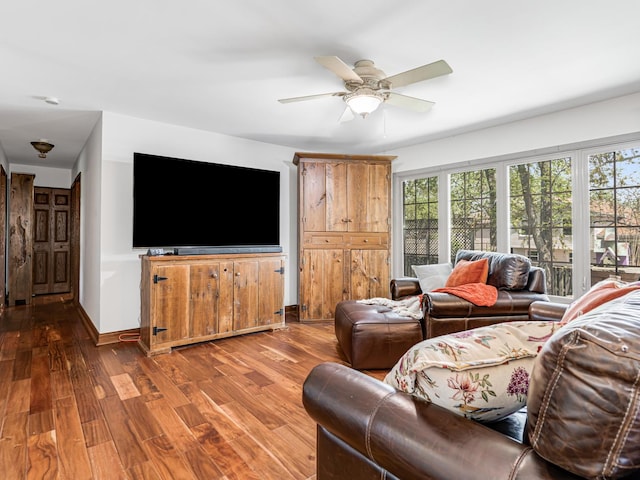 302 Delaware Dr, Bolingbrook, IL 60440 - living area with baseboards, a healthy amount of sunlight, ceiling fan, and wood finished floors