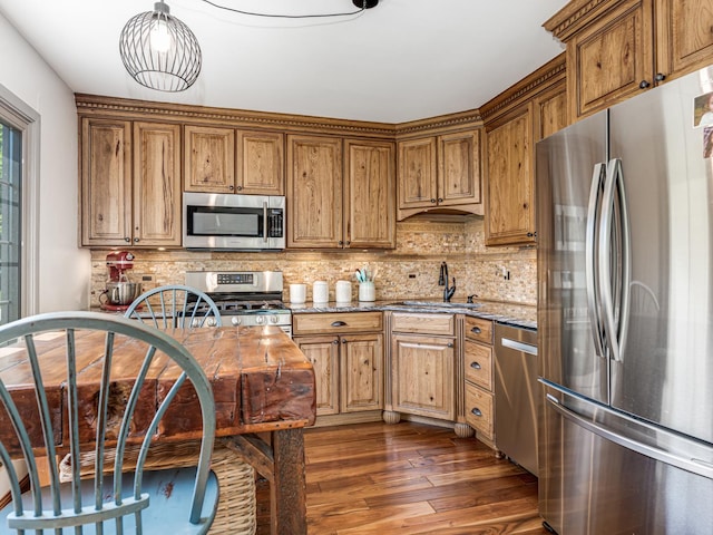 302 Delaware Dr, Bolingbrook, IL 60440 - kitchen featuring dark wood-style floors, tasteful backsplash, appliances with stainless steel finishes, and a sink