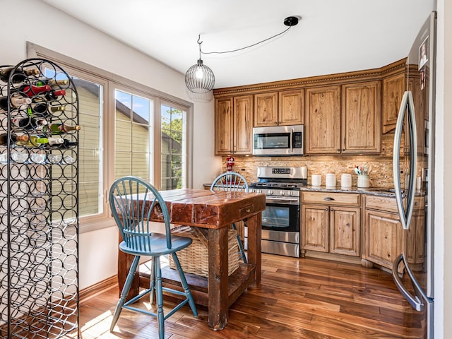 302 Delaware Dr, Bolingbrook, IL 60440 - kitchen featuring decorative backsplash, stainless steel appliances, dark wood-style flooring, and brown cabinets