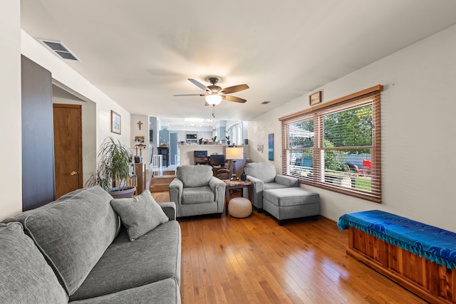 2810 Billie Limacher Ln, Plainfield, IL 60586 - living area with ceiling fan, light wood finished floors, and baseboards
