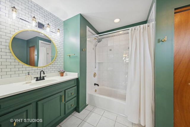 full bath featuring tile patterned floors, decorative backsplash, shower / tub combo with curtain, and vanity