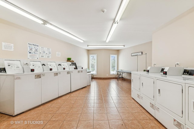 1450 Sandpebble Dr Unit 343, Wheeling, IL 60090 - shared laundry with washing machine and clothes dryer and light tile patterned flooring