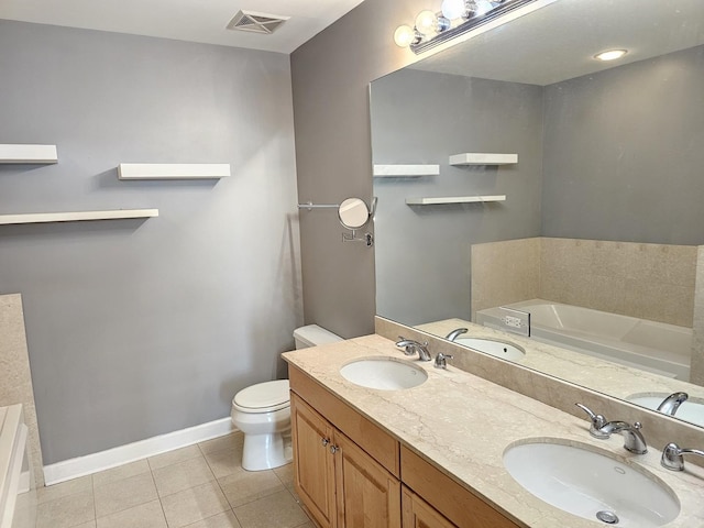 full bathroom with toilet, a garden tub, visible vents, and a sink