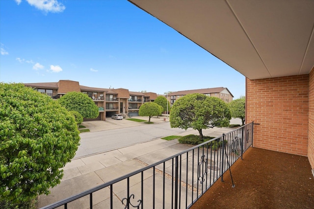 balcony featuring a residential view