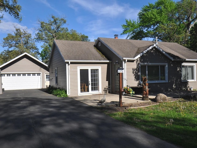 2912 Magellan Dr, Mchenry, IL 60051 - single story home featuring a garage, roof with shingles, an outdoor structure, and a chimney