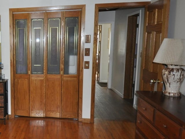 2912 Magellan Dr, Mchenry, IL 60051 - hallway featuring baseboards and dark wood-type flooring