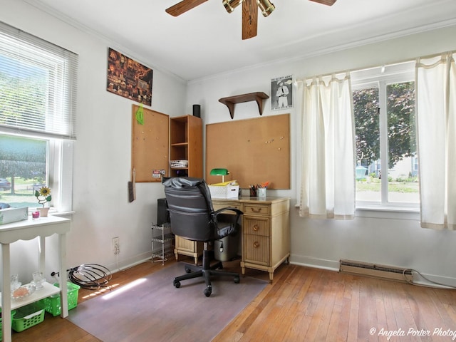 2912 Magellan Dr, Mchenry, IL 60051 - office space featuring a ceiling fan, a baseboard heating unit, healthy amount of natural light, and ornamental molding