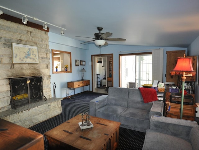 2912 Magellan Dr, Mchenry, IL 60051 - living room with carpet, ceiling fan, and a stone fireplace