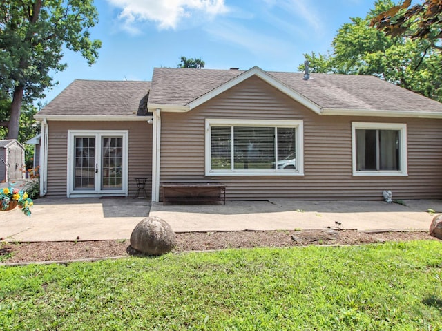 2912 Magellan Dr, Mchenry, IL 60051 - rear view of house with a patio area, a yard, and a shingled roof