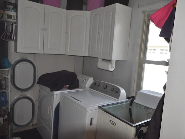 2912 Magellan Dr, Mchenry, IL 60051 - clothes washing area featuring separate washer and dryer and a sink