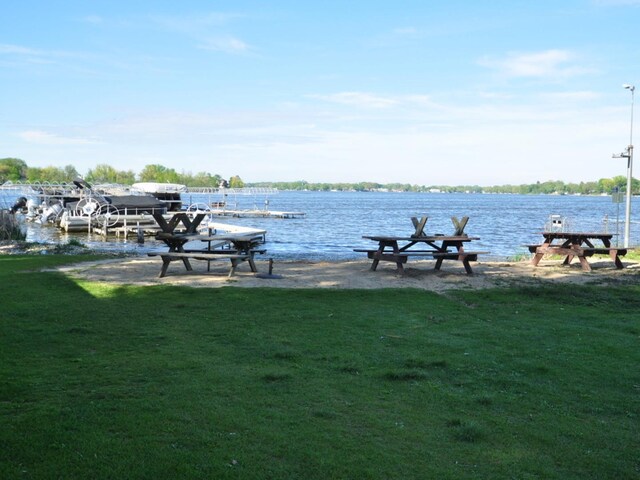2912 Magellan Dr, Mchenry, IL 60051 - dock featuring a yard and a water view