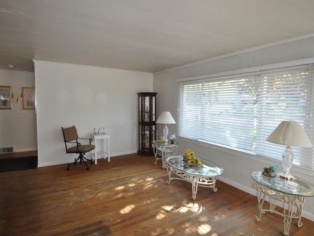 2912 Magellan Dr, Mchenry, IL 60051 - living area with wood finished floors, ornamental molding, and baseboards
