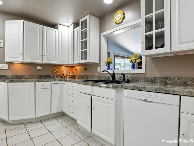 2912 Magellan Dr, Mchenry, IL 60051 - kitchen with dishwasher, light tile patterned floors, white cabinetry, glass insert cabinets, and dark countertops