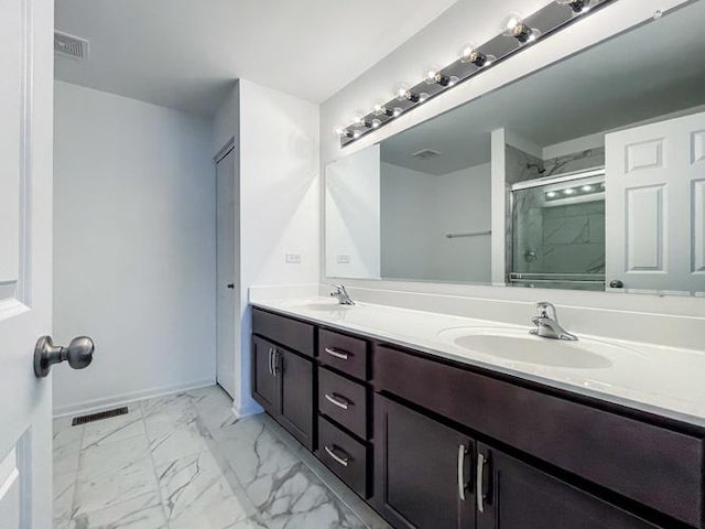 1587 Glenbrooke Ln, New Lenox, IL 60451 - bathroom featuring a sink, a stall shower, marble finish floor, and visible vents