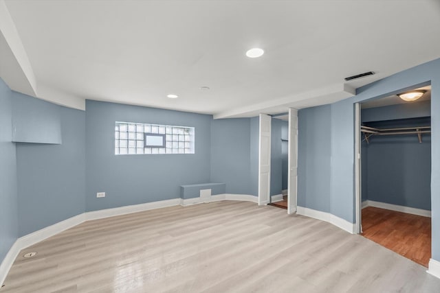 8943 S Lowe Ave, Chicago, IL 60620 - below grade area with baseboards, light wood-style floors, visible vents, and recessed lighting