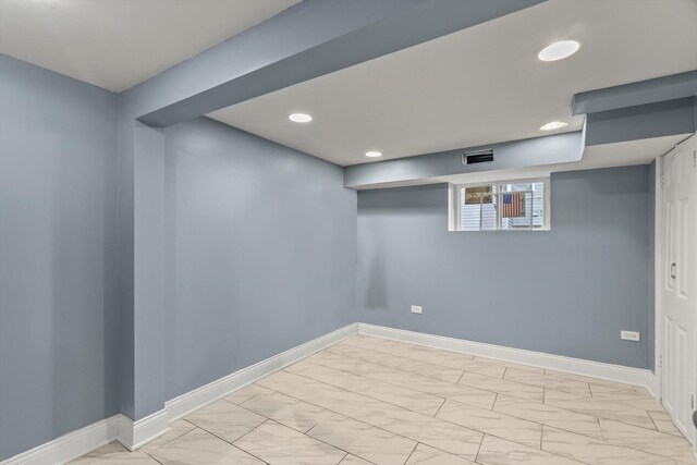 8943 S Lowe Ave, Chicago, IL 60620 - basement with visible vents, baseboards, marble finish floor, and recessed lighting