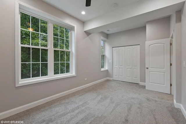 4631 S Evans Ave, Chicago, IL 60653 - unfurnished bedroom featuring carpet, baseboards, a closet, and ceiling fan