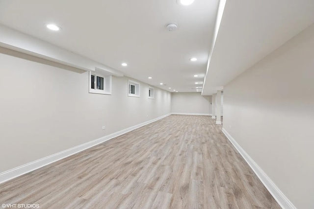 4631 S Evans Ave, Chicago, IL 60653 - finished below grade area with light wood-type flooring, baseboards, and recessed lighting