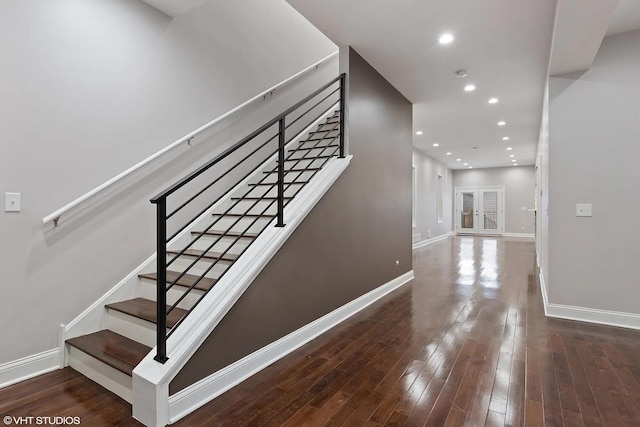 4631 S Evans Ave, Chicago, IL 60653 - staircase featuring baseboards, wood finished floors, and recessed lighting