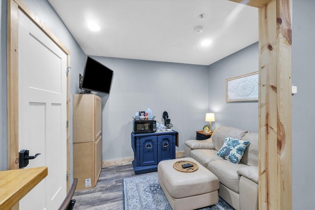 sitting room featuring wood finished floors and baseboards
