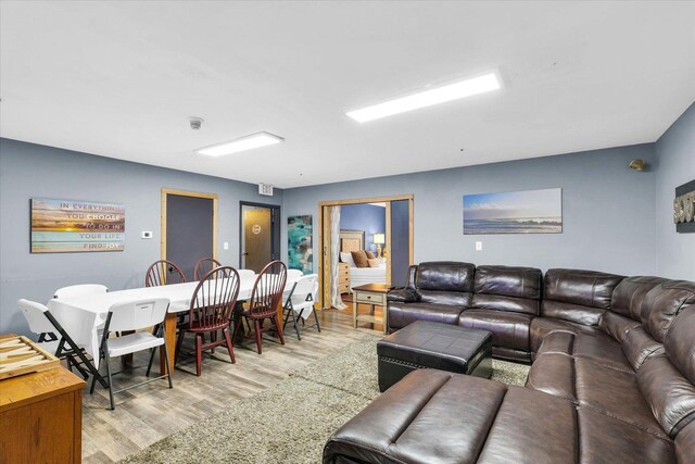 living area featuring light wood-style flooring
