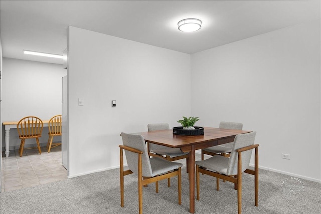 1313A S Rebecca Rd Unit 202, Lombard, IL 60148 - dining space featuring light carpet and baseboards