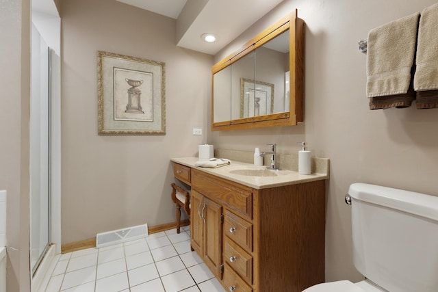 437 Wingate Dr, Schaumburg, IL 60193 - full bathroom featuring toilet, vanity, baseboards, an enclosed shower, and recessed lighting