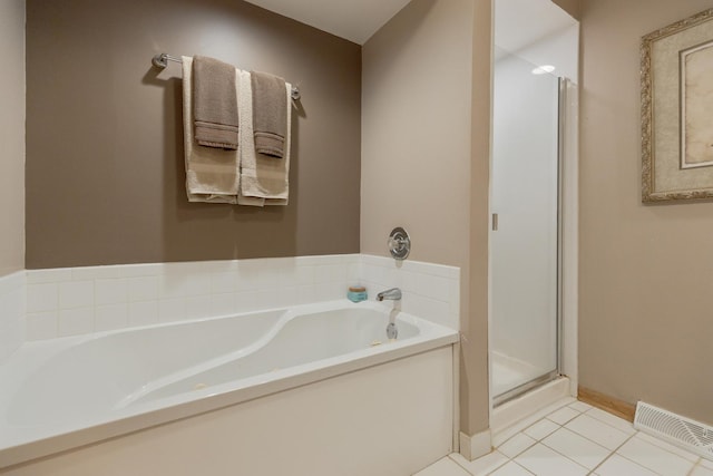 437 Wingate Dr, Schaumburg, IL 60193 - full bath featuring a stall shower, a bath, tile patterned floors, and baseboards