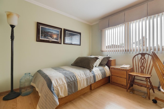 437 Wingate Dr, Schaumburg, IL 60193 - bedroom featuring light wood-type flooring and crown molding