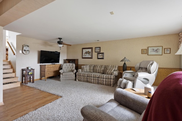 437 Wingate Dr, Schaumburg, IL 60193 - living area with wallpapered walls, ceiling fan, stairs, wood finished floors, and baseboards
