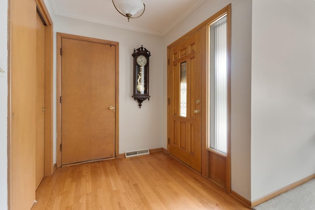 437 Wingate Dr, Schaumburg, IL 60193 - foyer with light wood finished floors, baseboards, and ornamental molding