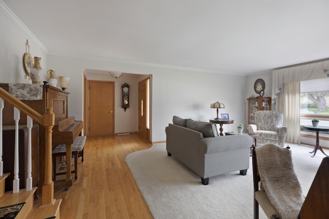 437 Wingate Dr, Schaumburg, IL 60193 - living room with crown molding, light wood finished floors, and stairs