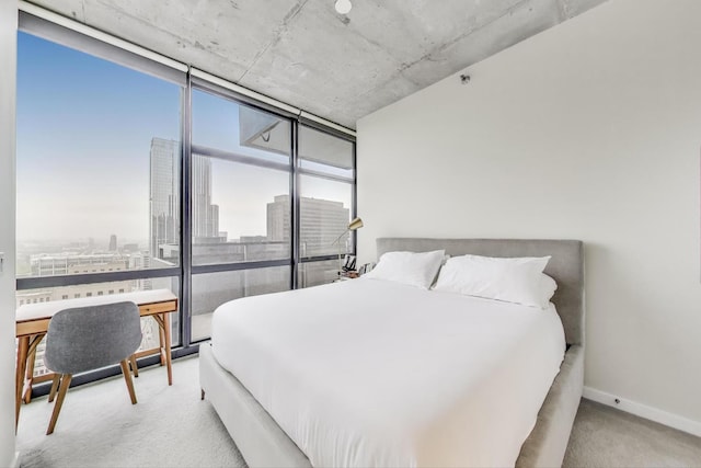 235 W Van Buren St Unit 3414, Chicago, IL 60607 - bedroom featuring carpet floors, a city view, and baseboards