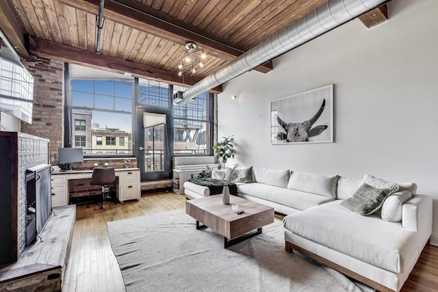 1000 W Washington Blvd Unit 342, Chicago, IL 60607 - living area with light wood finished floors, wood ceiling, and a healthy amount of sunlight