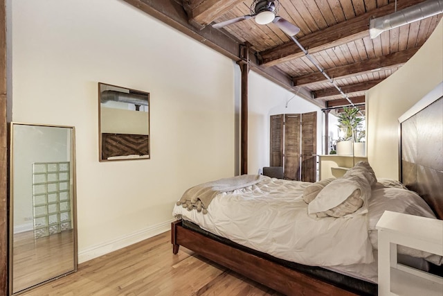 1000 W Washington Blvd Unit 342, Chicago, IL 60607 - bedroom with wooden ceiling, baseboards, wood finished floors, and beam ceiling