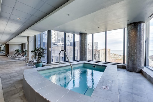 view of pool featuring an indoor hot tub and a pool