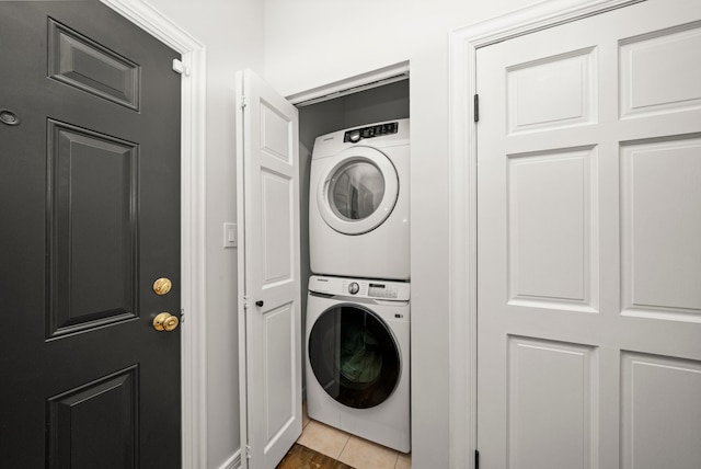 4353 S Indiana Ave Unit 3, Chicago, IL 60653 - clothes washing area featuring estacked washer and dryer and tile patterned flooring