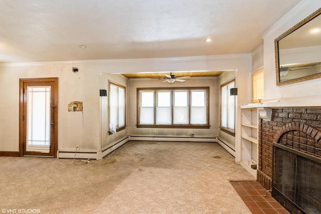 unfurnished living room featuring carpet floors, crown molding, a brick fireplace, a ceiling fan, and baseboards