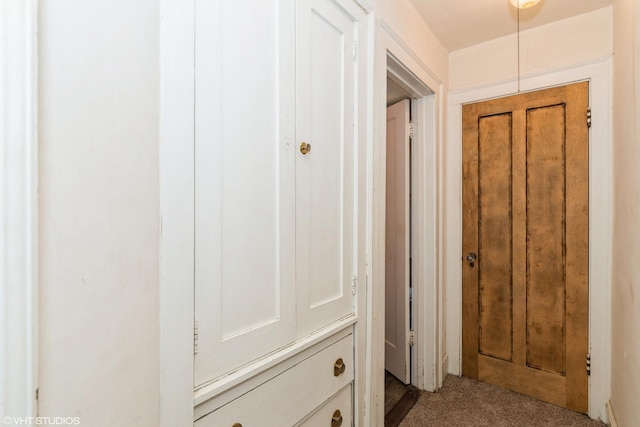 hall with light carpet