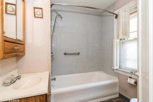 bathroom with shower / tub combination and vanity
