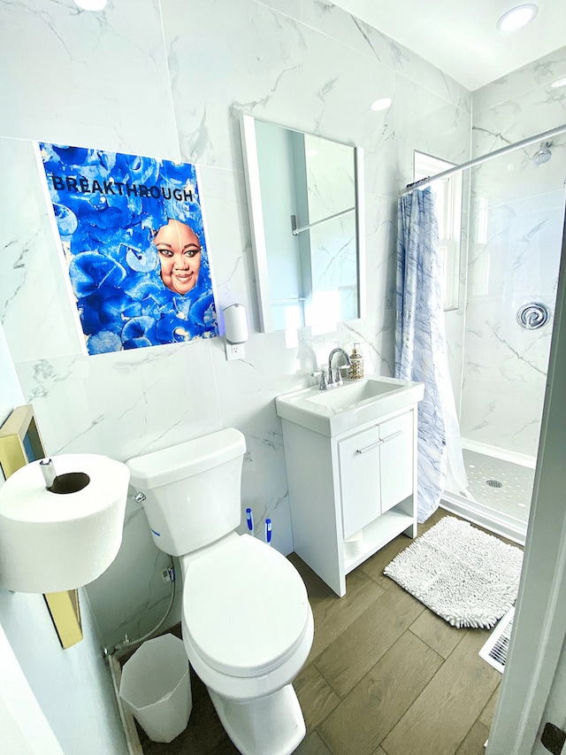 1313 Gordon Ave, Calumet City, IL 60409 - full bathroom with vanity, toilet, wood finished floors, and a shower stall
