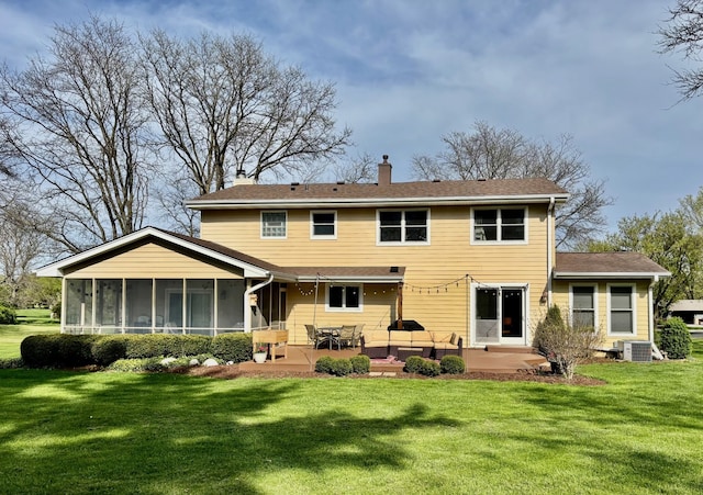 9 Aberdeen Rd, Hawthorn Woods, IL 60047 - rear view of house with central air condition unit, a yard, a patio, a chimney, and a sunroom
