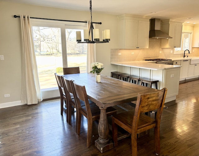 9 Aberdeen Rd, Hawthorn Woods, IL 60047 - dining area featuring an inviting chandelier, dark wood-type flooring, and baseboards