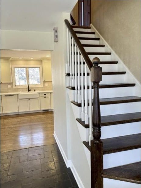 9 Aberdeen Rd, Hawthorn Woods, IL 60047 - stairway featuring baseboards and stone tile flooring