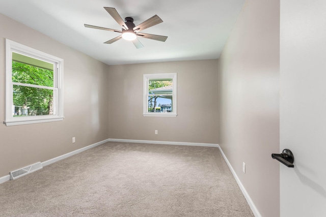 2705 Arlene Dr, Urbana, IL 61802 - unfurnished room featuring carpet floors, a ceiling fan, and baseboards