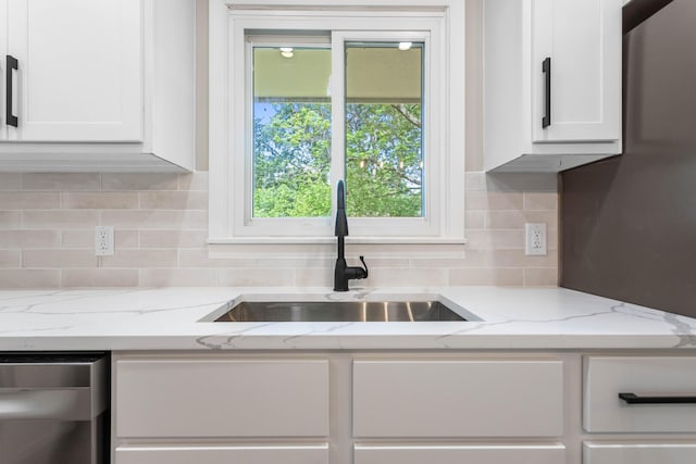 2705 Arlene Dr, Urbana, IL 61802 - kitchen with a sink, dishwasher, white cabinets, and backsplash